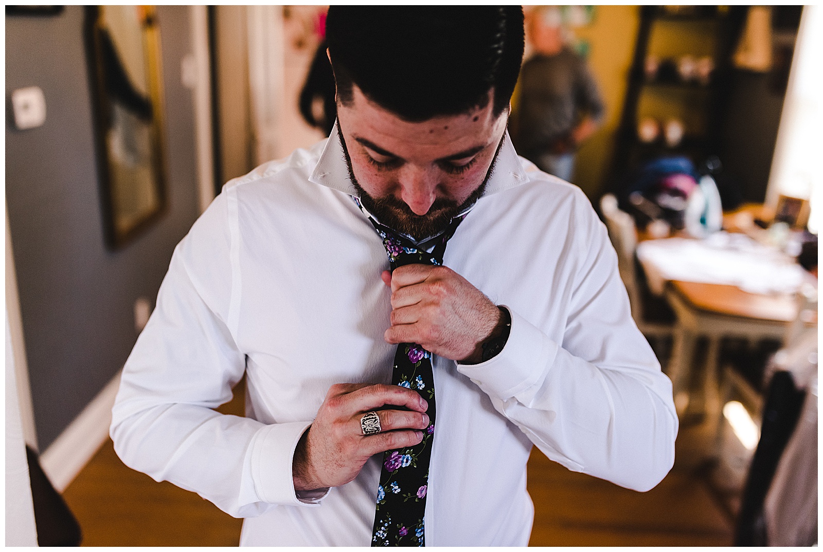 Adjusting that lovely boho tie.