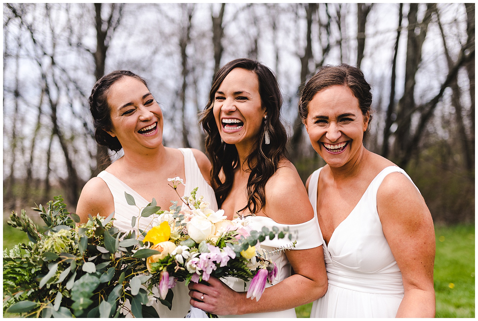 Sisters laughing on the wedding day. 