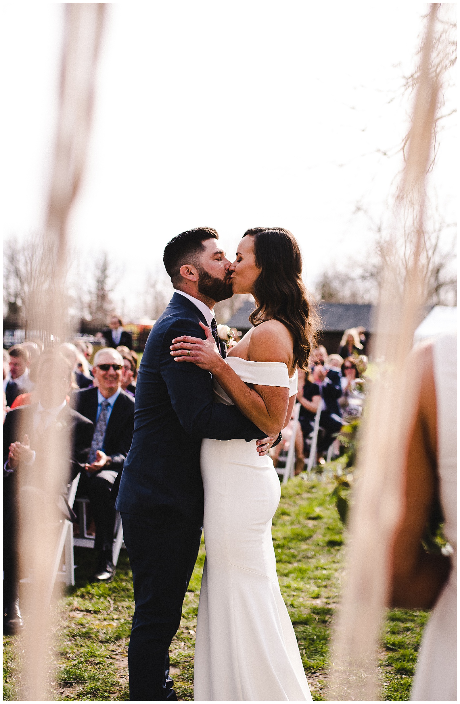 Bride and groom's first kiss as an officially married couple. 